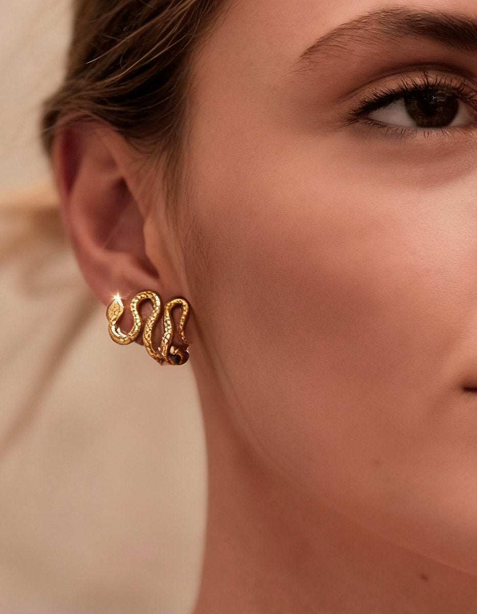 Poison gold-plated hammered stud snake earrings